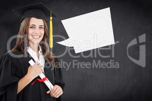 Composite image of a smiling woman with a degree in hand as she