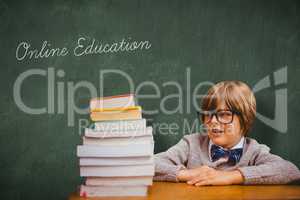 Online education against green chalkboard