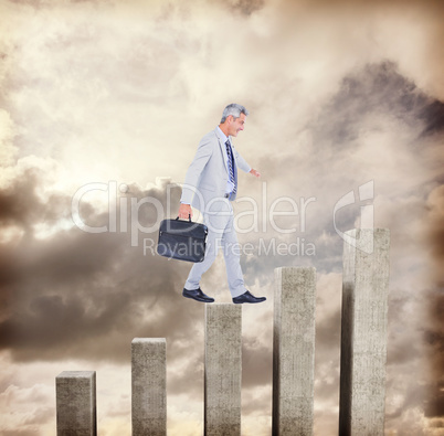 Composite image of side view of businessman walking with briefca