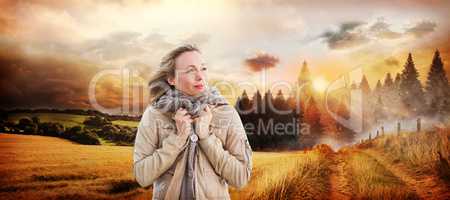 Composite image of pretty blonde in warm clothes