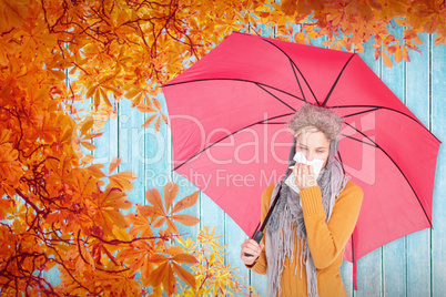 Composite image of woman blowing her nose with a tissue