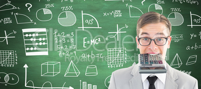 Composite image of geeky smiling businessman biting calculator