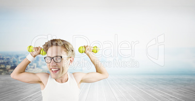 Composite image of nerd lifting weights