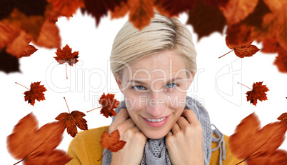 Composite image of smiling woman wearing a scarf