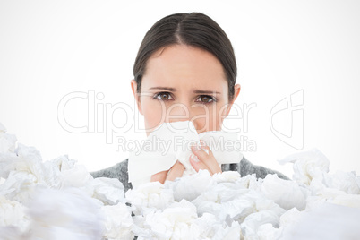 Composite image of portrait of a casual young woman suffering fr