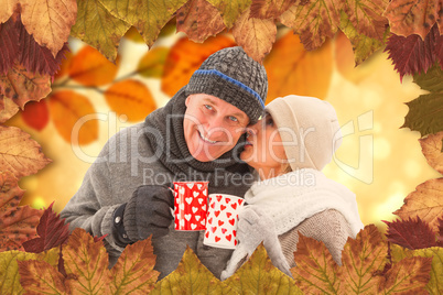 Composite image of happy mature couple in winter clothes holding