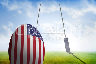 Composite image of american flag rugby ball