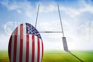 Composite image of american flag rugby ball