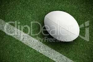 Composite image of close-up of rugby ball