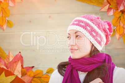 Composite image of pretty brunette in winter clothes