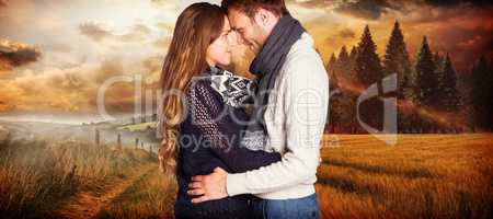 Composite image of side view of young couple embracing
