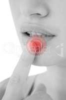 Composite image of woman pointing her lip