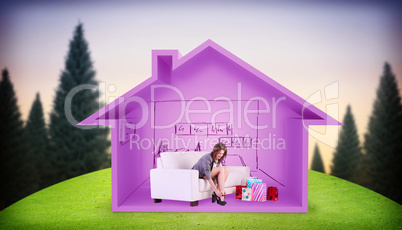 Composite image of cute woman sitting on couch taking off her sh