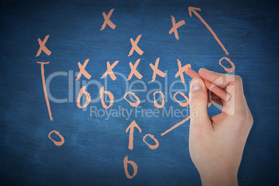 Composite image of hand writing with a chalk