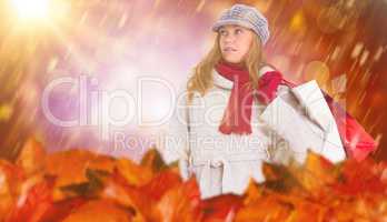 Composite image of happy blonde in winter clothes posing