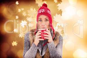 Composite image of blonde in winter clothes smiling at camera