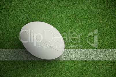 Composite image of close-up of rugby ball