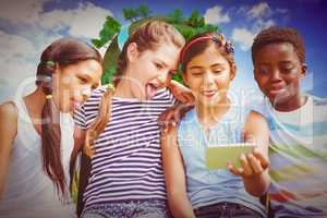 Composite image of happy children taking selfie at park