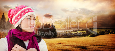 Composite image of pretty brunette in winter clothes