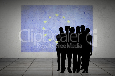 Composite image of silhouette of team of people