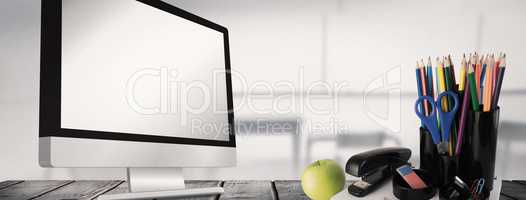 Composite image of school supplies on desk