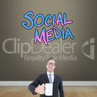 Composite image of happy geeky businessman holding coffee mug