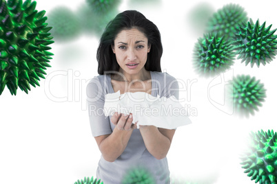 Composite image of sick brunette looking at camera
