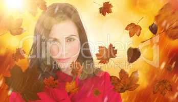 Composite image of portrait of a beautiful brunette in red coat