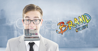 Composite image of geeky smiling businessman biting calculator Composite image of geeky smiling businessman biting calculator