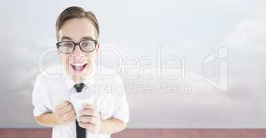 Composite image of geeky businessman holding a mug