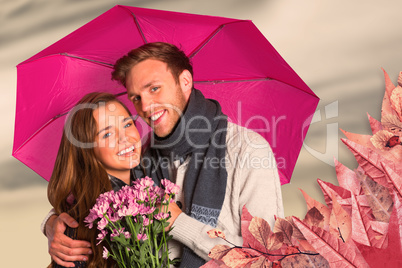 Composite image of cheerful young couple with flowers and umbrel