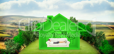 Composite image of smiling business woman lying down on the couc