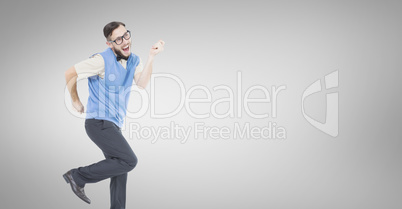 Composite image of geeky hipster dancing and smiling