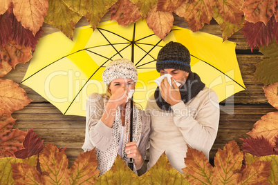 Composite image of couple sneezing in tissue while standing unde