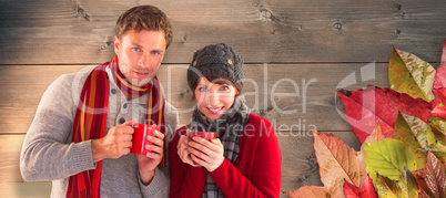 Composite image of couple both having warm drinks