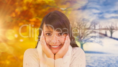 Composite image of brunette in winter clothes smiling at camera