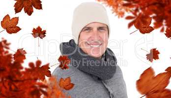 Composite image of casual man in warm clothing