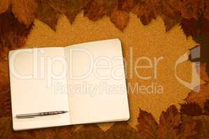 Composite image of notebook and pen