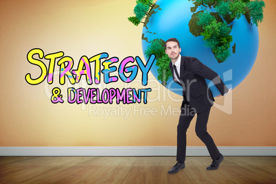 Composite image of businessman carrying the world