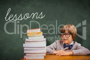 Lessons against green chalkboard