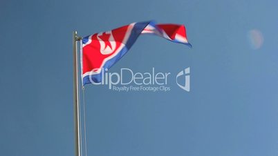 North Korea flag in front of blue sky