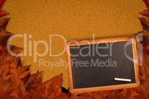 Composite image of chalkboard with piece of chalk