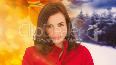 Composite image of portrait of a beautiful brunette in red coat