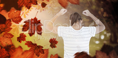 Composite image of depressed woman with hands raised