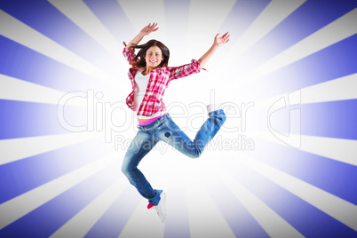 Composite image of casual brunette jumping and smiling