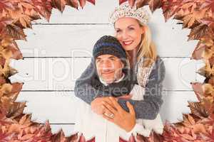 Composite image of happy wife embracing husband