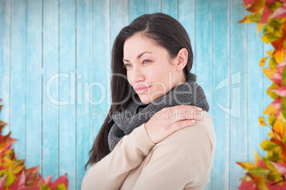 Composite image of gorgeous brunette looking away