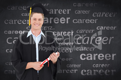 Composite image of man smiling as he has just graduated with his