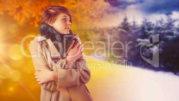 Composite image of thoughtful woman in winter coat