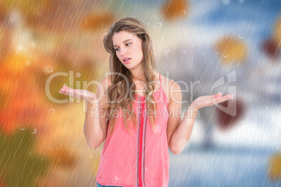 Composite image of unsure woman gesturing do not know sign